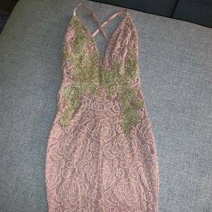 Long blush & gold dress.